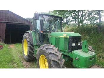 Farm tractor John Deere 6210 se