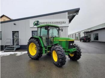 Farm tractor John Deere 6210 se