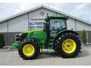 Farm tractor John Deere 7260R TLS affedert foraksel og affedert kabine.