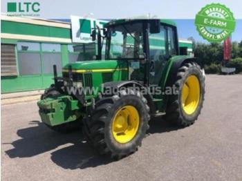 Farm tractor John Deere 6310: picture 1