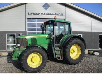 Farm tractor John Deere 6920 AutoPowr TLS Med frontlift: picture 1