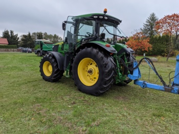 Farm tractor John Deere 7215R: picture 1