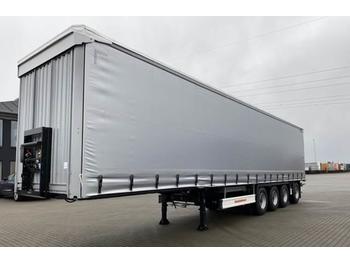Curtainsider semi-trailer Kässbohrer 4 Akslet med Plywood Bund