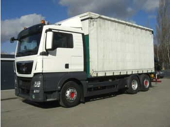 Dropside/ Flatbed truck MAN 26440L TGX / Glastaransport / KRAN HMF2120: picture 1