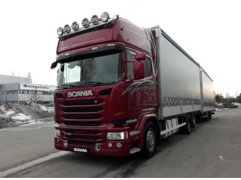 Curtain side truck SCANIA R450: picture 1