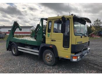 Skip loader truck Volvo FL612: picture 1