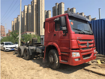 Dropside/ Flatbed truck for transportation of heavy machinery howo HOWO 371 Tractor: picture 1