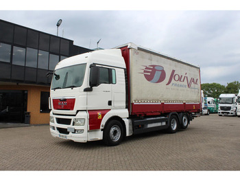 Curtain side truck MAN TGX 26.440