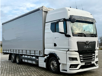 Curtain side truck MAN TGX