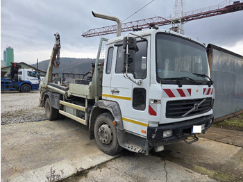 Skip loader truck VOLVO FL6