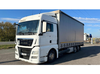 Curtain side truck MAN TGX