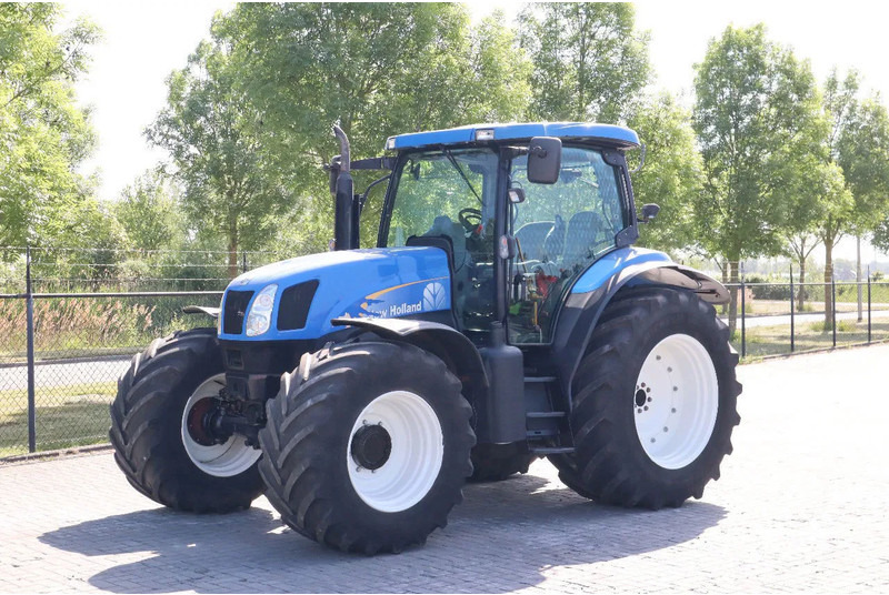 New Holland TS135A | 40 KM/H | 4X4 | SUPERSTEER - Farm tractor: picture 1 New Holland TS135A | 40 KM/H | 4X4 | SUPERSTEER - Farm tractor: picture 1