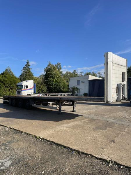 Dropside/ Flatbed semi-trailer Schmitz Cargobull: picture 1