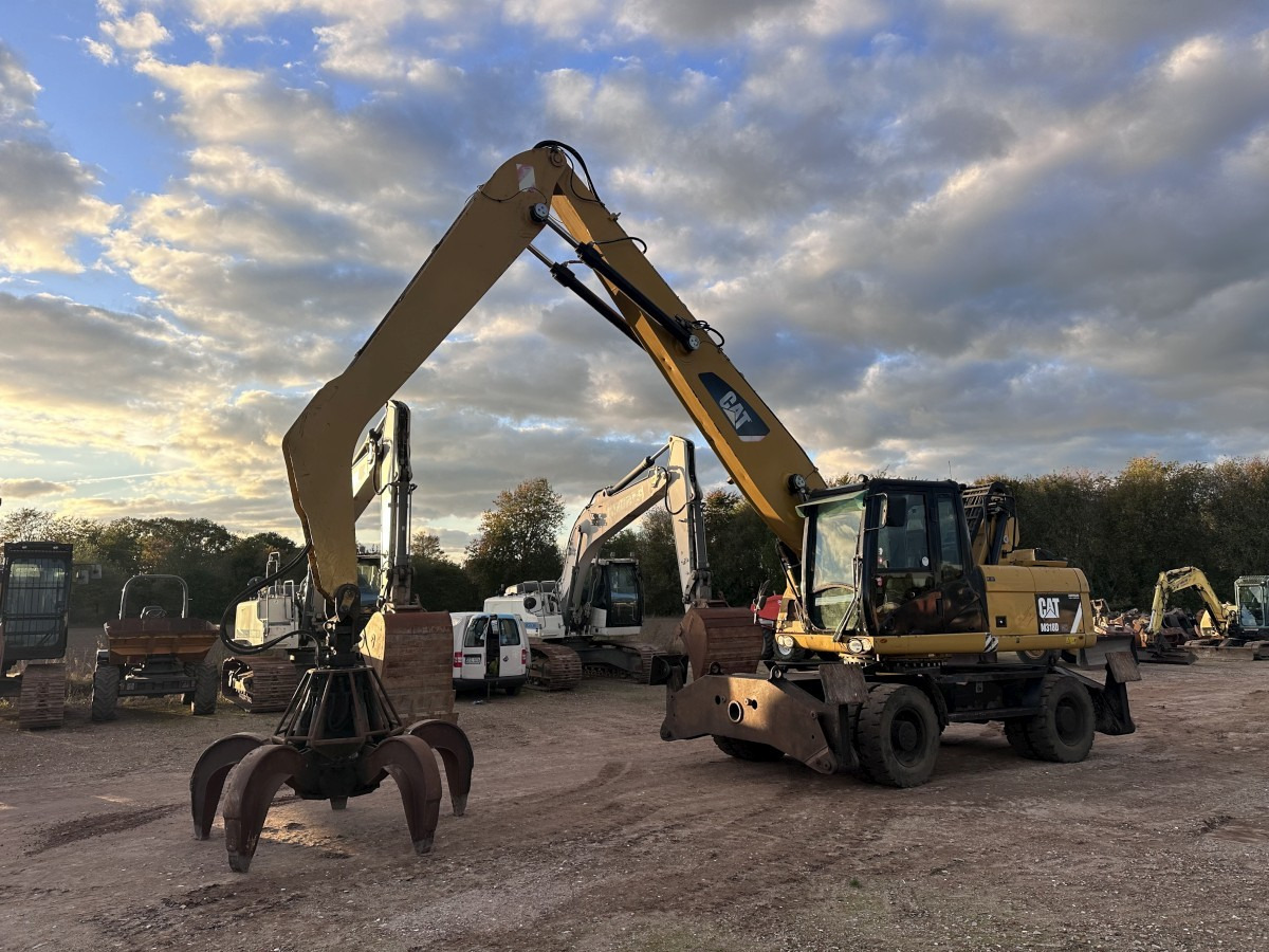 CATERPILLAR M 318 MH mit Greifer Kein 3022 3026 320 322 - Material handler: picture 1 CATERPILLAR M 318 MH mit Greifer Kein 3022 3026 320 322 - Material handler: picture 1