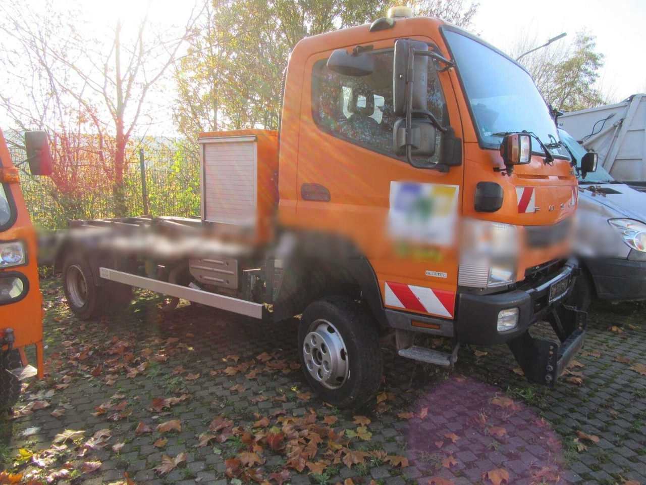 Mitsubishi Canter Fuso 6C18 4x4 Canter Fuso 6C18 4x4, Winterdienstausstattung, City-Abroller - Hook lift truck: picture 1 Mitsubishi Canter Fuso 6C18 4x4 Canter Fuso 6C18 4x4, Winterdienstausstattung, City-Abroller - Hook lift truck: picture 1