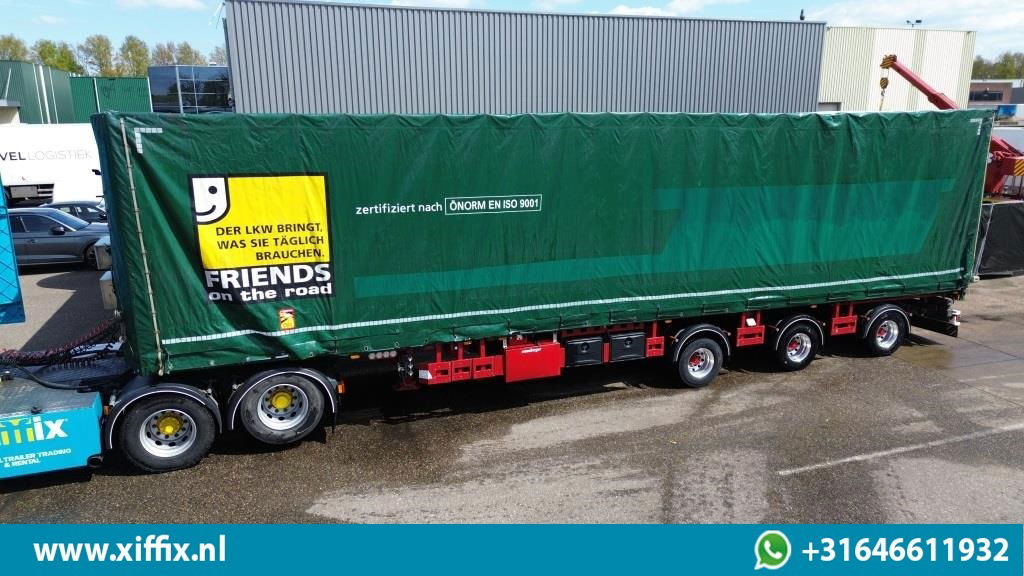 Meusburger 3-ass. Vlakke dubbel 2x uitschuifbare oplegger met huifopbouw / 3x ge - Dropside/ Flatbed semi-trailer: picture 2 Meusburger 3-ass. Vlakke dubbel 2x uitschuifbare oplegger met huifopbouw / 3x ge - Dropside/ Flatbed semi-trailer: picture 2
