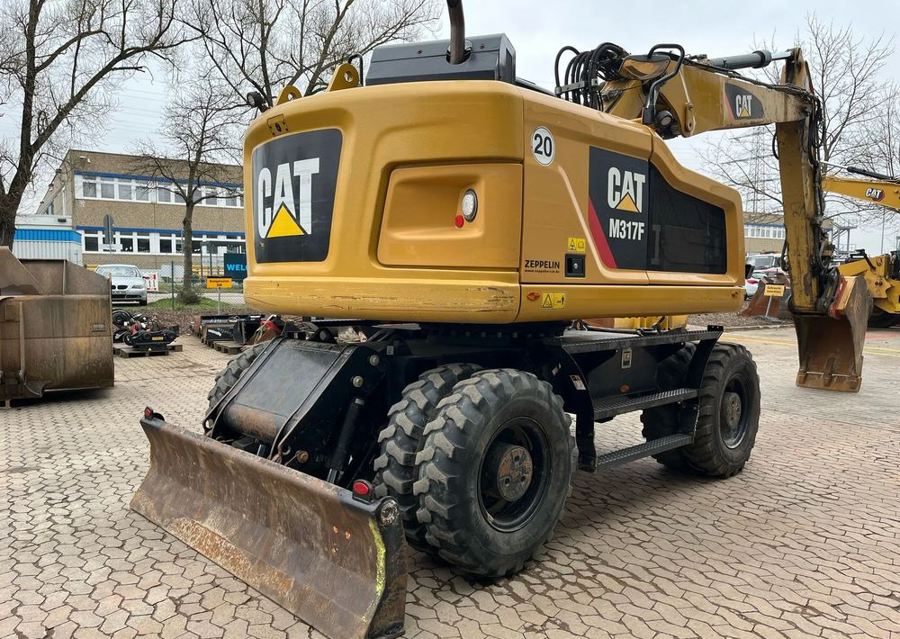 Caterpillar M317F, 2019 ROK, 5100 MTH, OIL QUICK - Wheel excavator: picture 2 Caterpillar M317F, 2019 ROK, 5100 MTH, OIL QUICK - Wheel excavator: picture 2