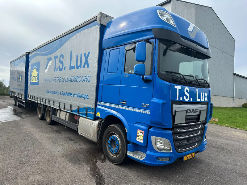 DAF XF 440 6x2 / SUPERSPACECAB / KOMBI MIT ANHANGER SCHMITZ 2016 / DURCHLADEN / 2 STUCK - Curtain side truck: picture 2 DAF XF 440 6x2 / SUPERSPACECAB / KOMBI MIT ANHANGER SCHMITZ 2016 / DURCHLADEN / 2 STUCK - Curtain side truck: picture 2