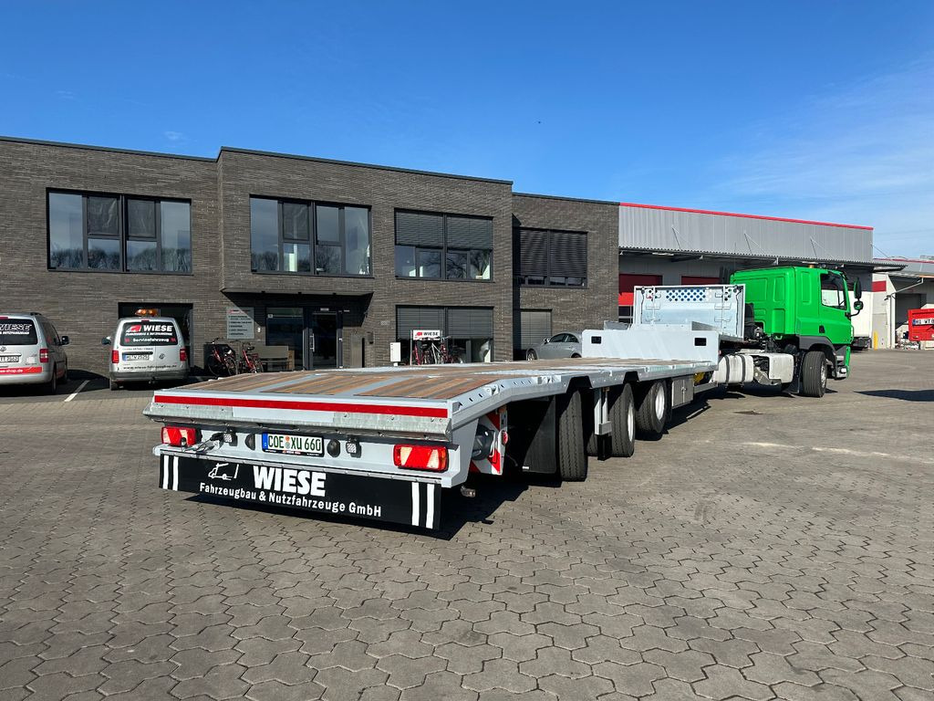 3-Achser Tieflader Zwangslenkung Betonteile - Low loader semi-trailer: picture 1 3-Achser Tieflader Zwangslenkung Betonteile - Low loader semi-trailer: picture 1