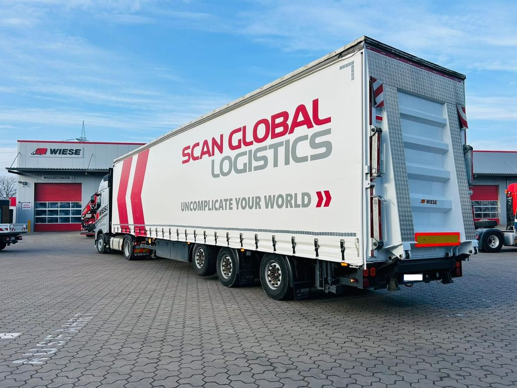 Mega Gabelstaplertransporter Ladebordwand9t - Dropside/ Flatbed semi-trailer: picture 1 Mega Gabelstaplertransporter Ladebordwand9t - Dropside/ Flatbed semi-trailer: picture 1