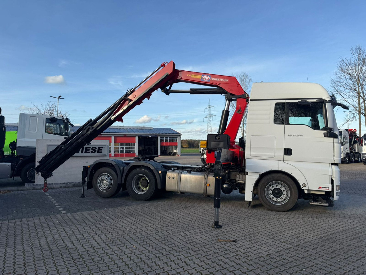 MAN TGX 26.440 6x2 mit HMF 3000-K5 Kran Top Zustand - Tractor unit: picture 1 MAN TGX 26.440 6x2 mit HMF 3000-K5 Kran Top Zustand - Tractor unit: picture 1