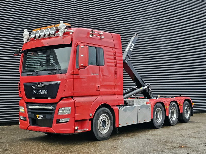 MAN TGX 35.500 / 8x4-4 / ABROLL-KIPPER / HOOKLIFT - Hook lift truck: picture 1 MAN TGX 35.500 / 8x4-4 / ABROLL-KIPPER / HOOKLIFT - Hook lift truck: picture 1