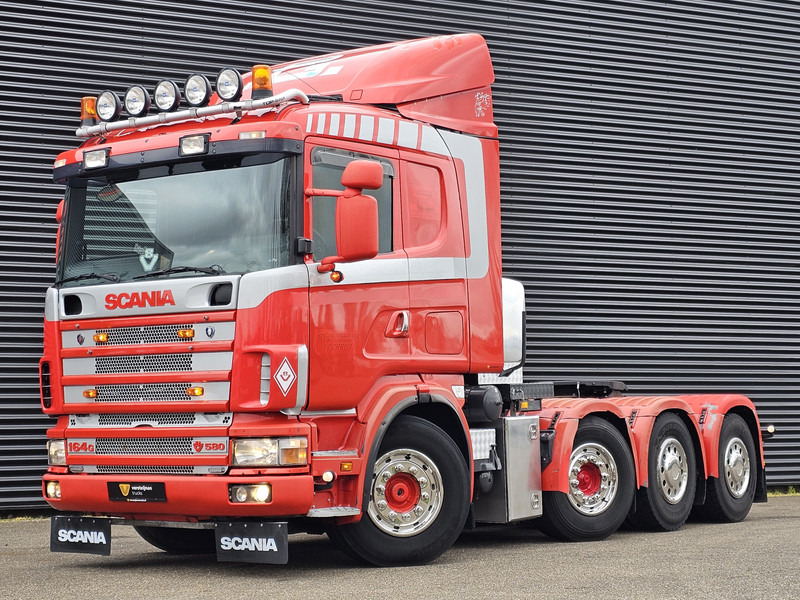 Scania R 164.580 8x4-4 / 150T / MANUAL / RETARDER / BIG AXLE - Tractor unit: picture 1 Scania R 164.580 8x4-4 / 150T / MANUAL / RETARDER / BIG AXLE - Tractor unit: picture 1