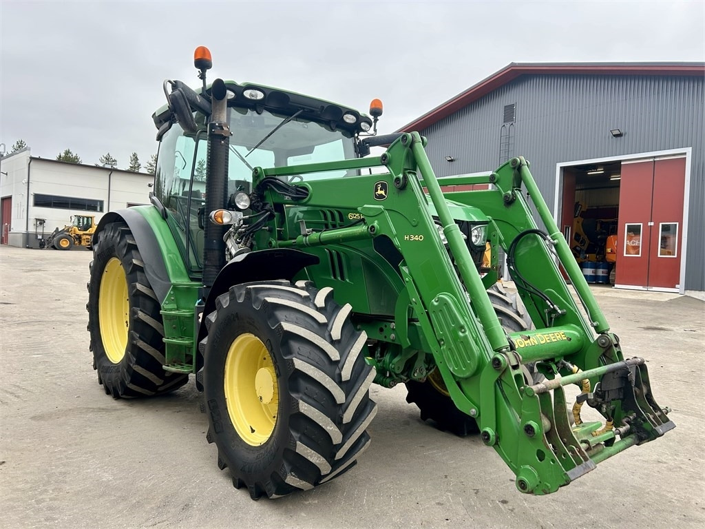 John Deere 6125 R AUTOPOWER ETUKUORMAAJALLA - Farm tractor: picture 4 John Deere 6125 R AUTOPOWER ETUKUORMAAJALLA - Farm tractor: picture 4
