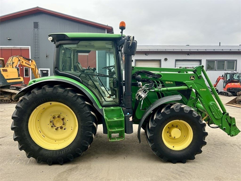 John Deere 6125 R AUTOPOWER ETUKUORMAAJALLA - Farm tractor: picture 5 John Deere 6125 R AUTOPOWER ETUKUORMAAJALLA - Farm tractor: picture 5