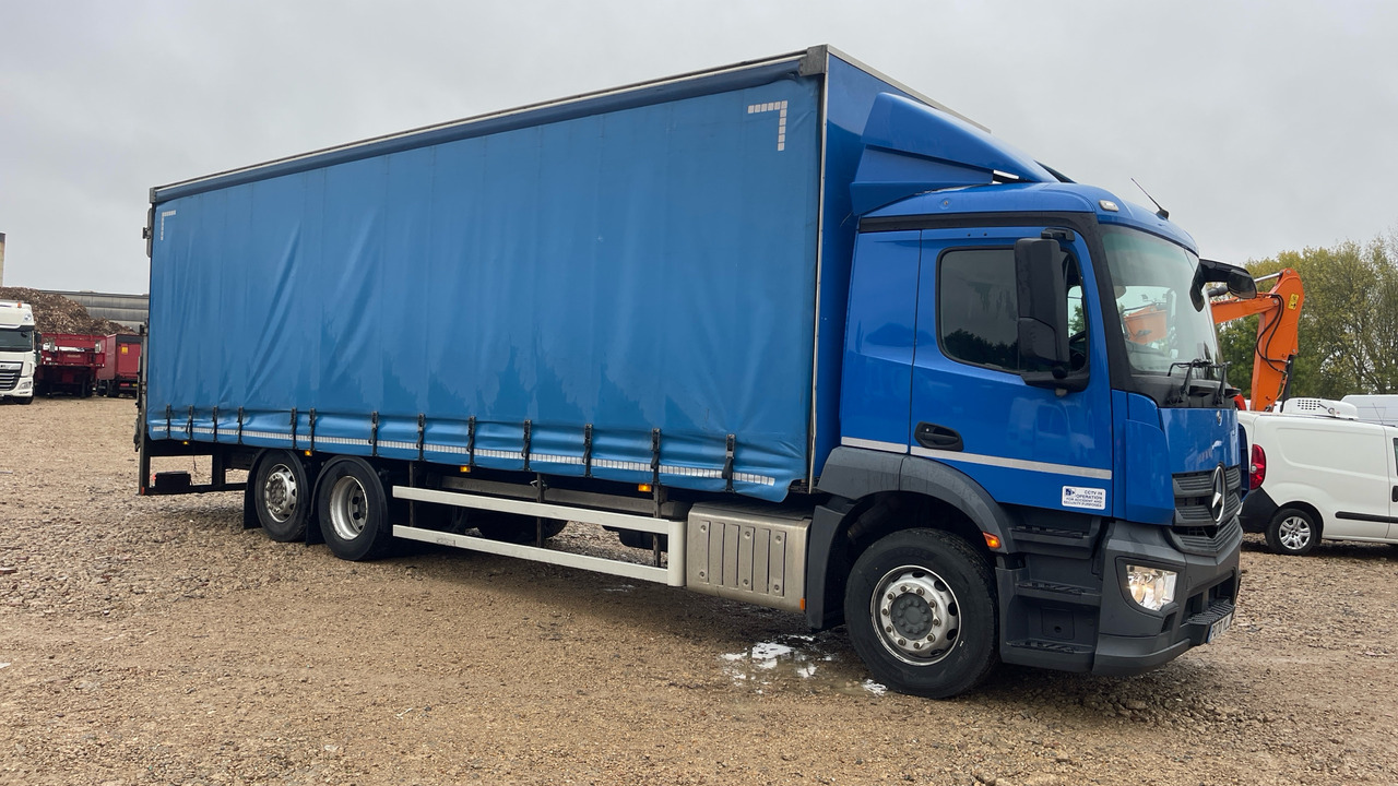 Curtain side truck Mercedes-Benz Antos: picture 1