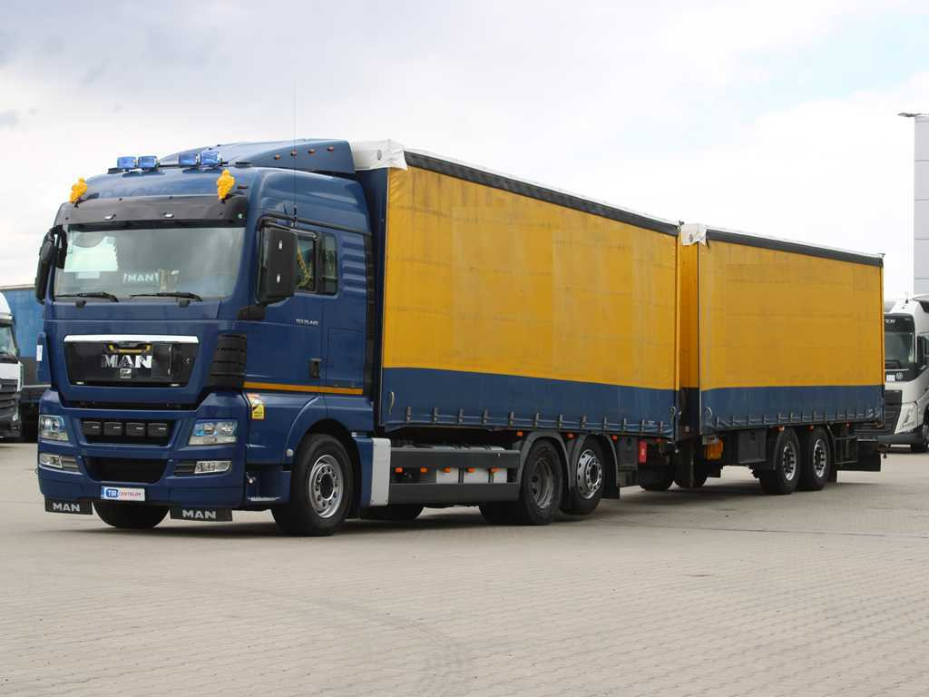 MAN TGS 26.440, 6X2, EURO 5, LIFTING AXLE, TV + K&G ZPA 18 - Curtain side truck: picture 1 MAN TGS 26.440, 6X2, EURO 5, LIFTING AXLE, TV + K&G ZPA 18 - Curtain side truck: picture 1
