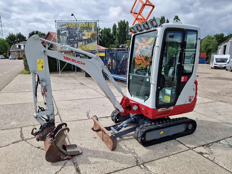 Takeuchi TB216 met 2089 uur - Mini excavator: picture 1 Takeuchi TB216 met 2089 uur - Mini excavator: picture 1