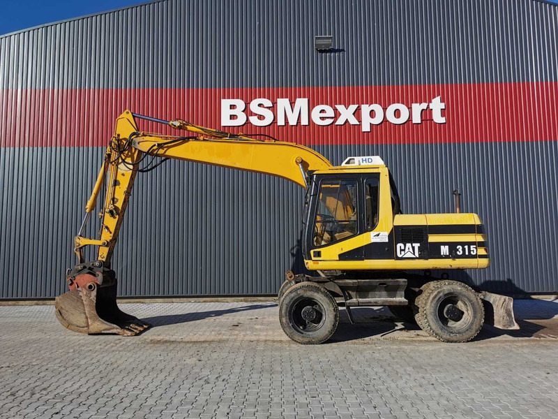 Caterpillar M315 wheel excavator - Wheel excavator: picture 1 Caterpillar M315 wheel excavator - Wheel excavator: picture 1