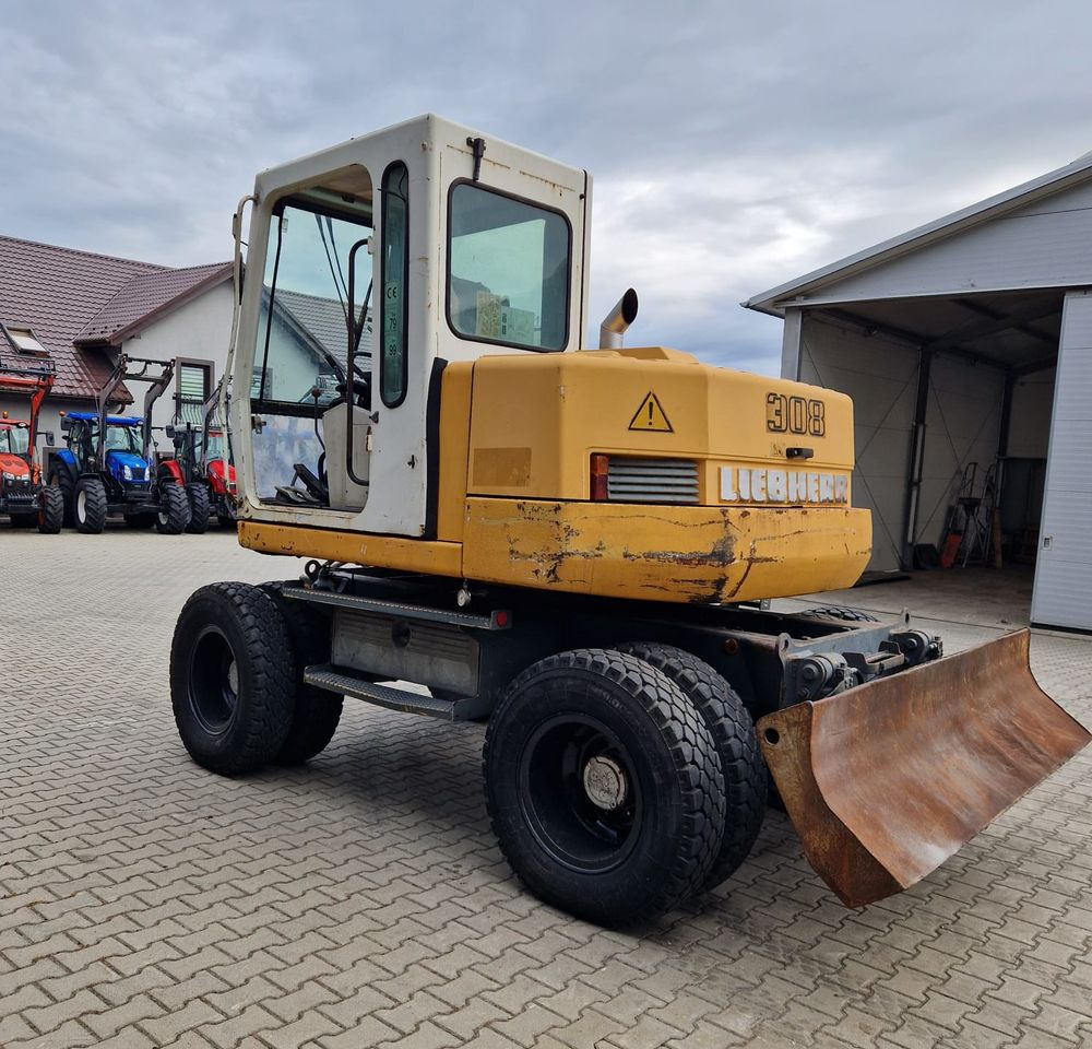 Pozostałe części Liebherr Liebherr A308 1999 Koparka kołowa Liebherr 308 - Excavator: picture 4 Pozostałe części Liebherr Liebherr A308 1999 Koparka kołowa Liebherr 308 - Excavator: picture 4