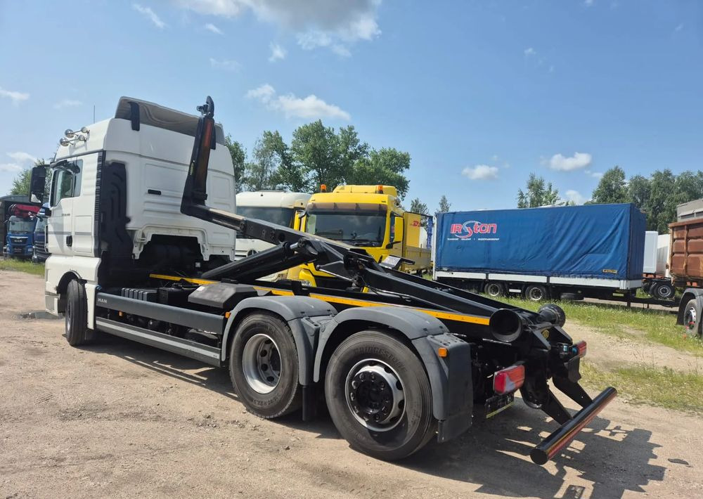 MAN TGX 26-460 Hakowiec oś skrętna - Hook lift truck: picture 1 MAN TGX 26-460 Hakowiec oś skrętna - Hook lift truck: picture 1