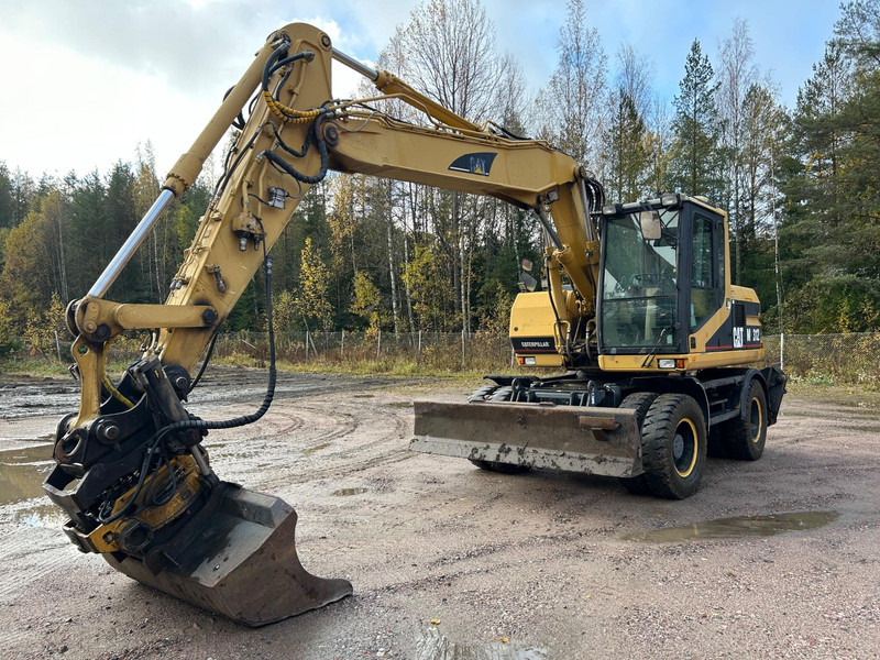Caterpillar M312 Engcon EC20 tiltrotator - Wheel excavator: picture 1 Caterpillar M312 Engcon EC20 tiltrotator - Wheel excavator: picture 1