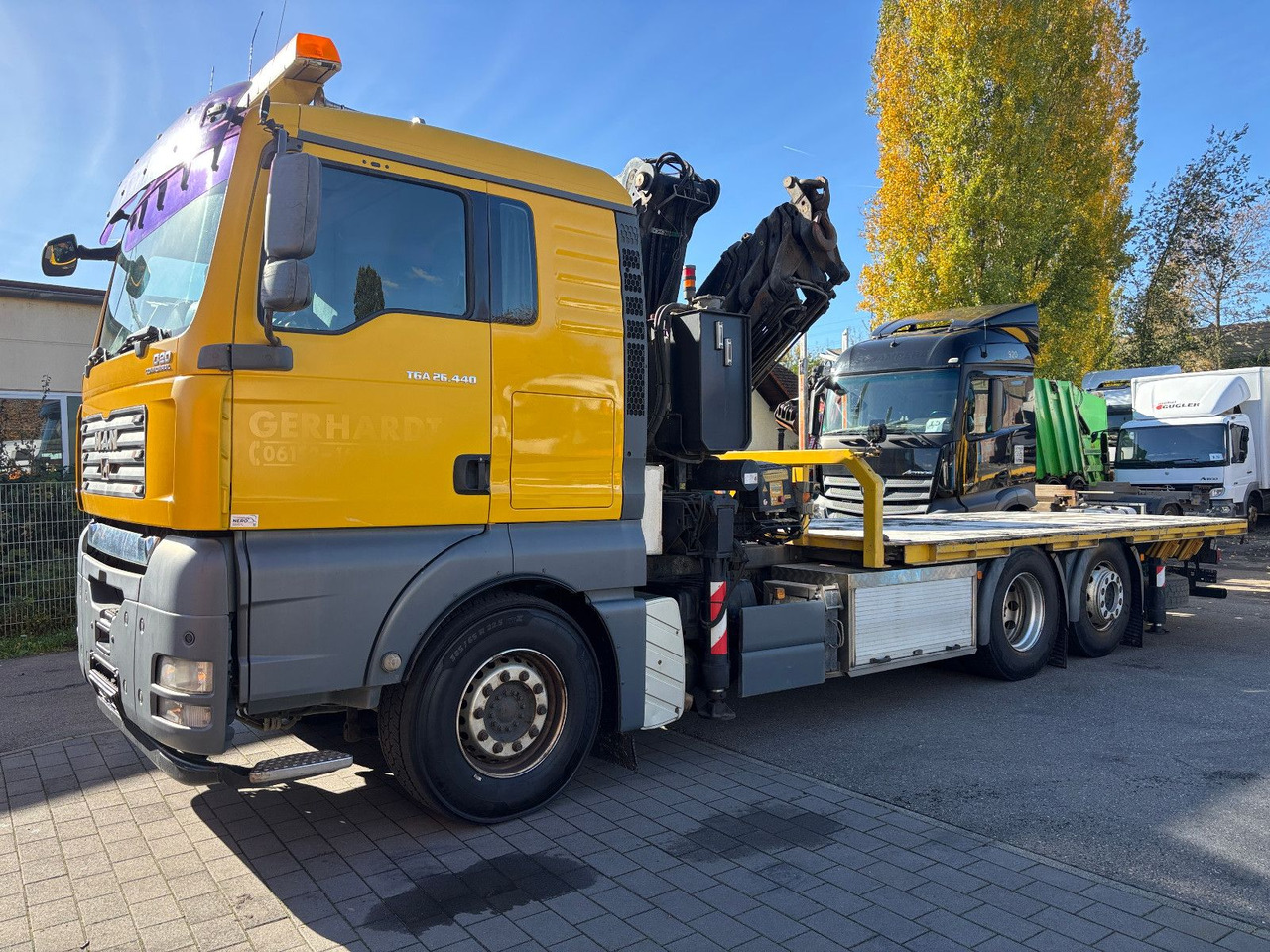 MAN TGA 26.440 FASSI F450AXP Containerauf./Lenkachse - Crane truck: picture 1 MAN TGA 26.440 FASSI F450AXP Containerauf./Lenkachse - Crane truck: picture 1