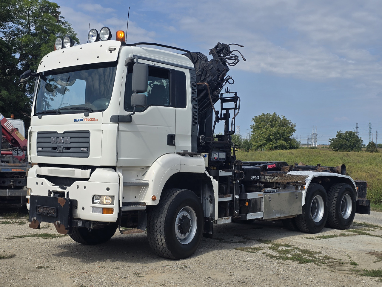 MAN TGA 26.440 6X6 / HOOK SYSTEM / HIAB 166D REMOTE SPECIAL PRICE ONLY THIS YEAR - Hook lift truck, Crane truck: picture 1 MAN TGA 26.440 6X6 / HOOK SYSTEM / HIAB 166D REMOTE SPECIAL PRICE ONLY THIS YEAR - Hook lift truck, Crane truck: picture 1