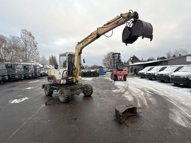 Yanmar YB 401 W Greifer und Schaufel - Wheel excavator: picture 1 Yanmar YB 401 W Greifer und Schaufel - Wheel excavator: picture 1
