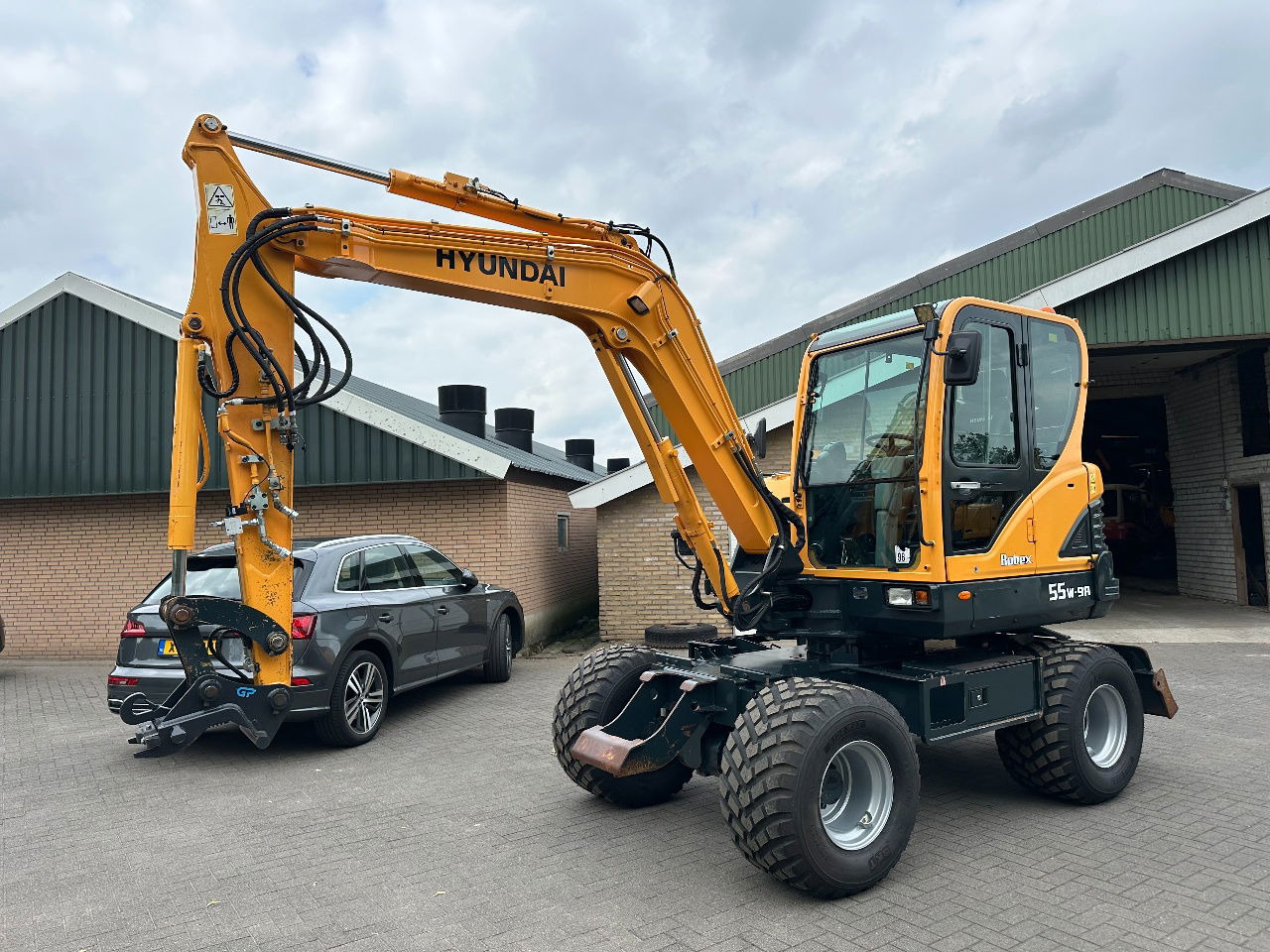 Hyundai 55W-9A - Wheel excavator: picture 1 Hyundai 55W-9A - Wheel excavator: picture 1