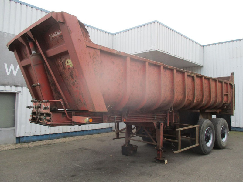 Fruehauf D33C , 2 axle , Steel tipper trailer , Drum Brakes , Spring suspension - Tipper semi-trailer: picture 1 Fruehauf D33C , 2 axle , Steel tipper trailer , Drum Brakes , Spring suspension - Tipper semi-trailer: picture 1