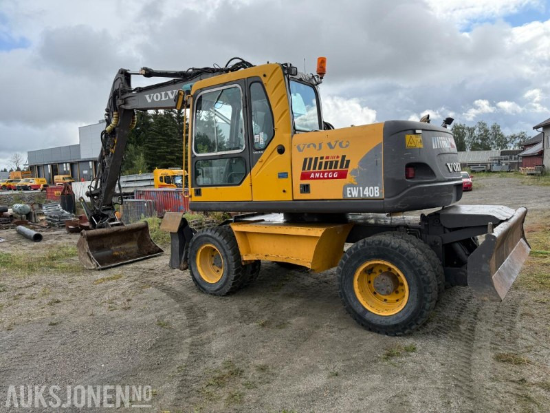 2006 Volvo EW140B Hjulgraver m/pallegaffel og skuff - Steelwrist tiltrotator. - Excavator: picture 5 2006 Volvo EW140B Hjulgraver m/pallegaffel og skuff - Steelwrist tiltrotator. - Excavator: picture 5
