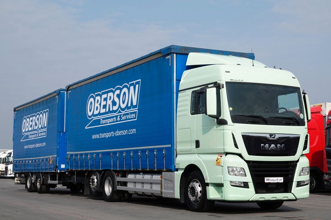 MAN TGX 26.460 / ZESTAW TANDEM PRZEJAZDOWY / 120 M3 - Curtain side truck: picture 1 MAN TGX 26.460 / ZESTAW TANDEM PRZEJAZDOWY / 120 M3 - Curtain side truck: picture 1