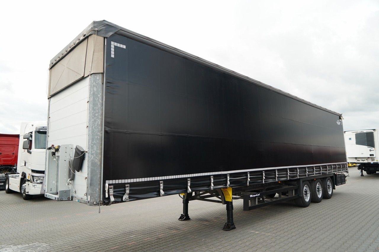 Schmitz Cargobull FIRANKA VARIOS / PODNOSZONY DACH / STANDARD - Curtainsider semi-trailer: picture 2 Schmitz Cargobull FIRANKA VARIOS / PODNOSZONY DACH / STANDARD - Curtainsider semi-trailer: picture 2