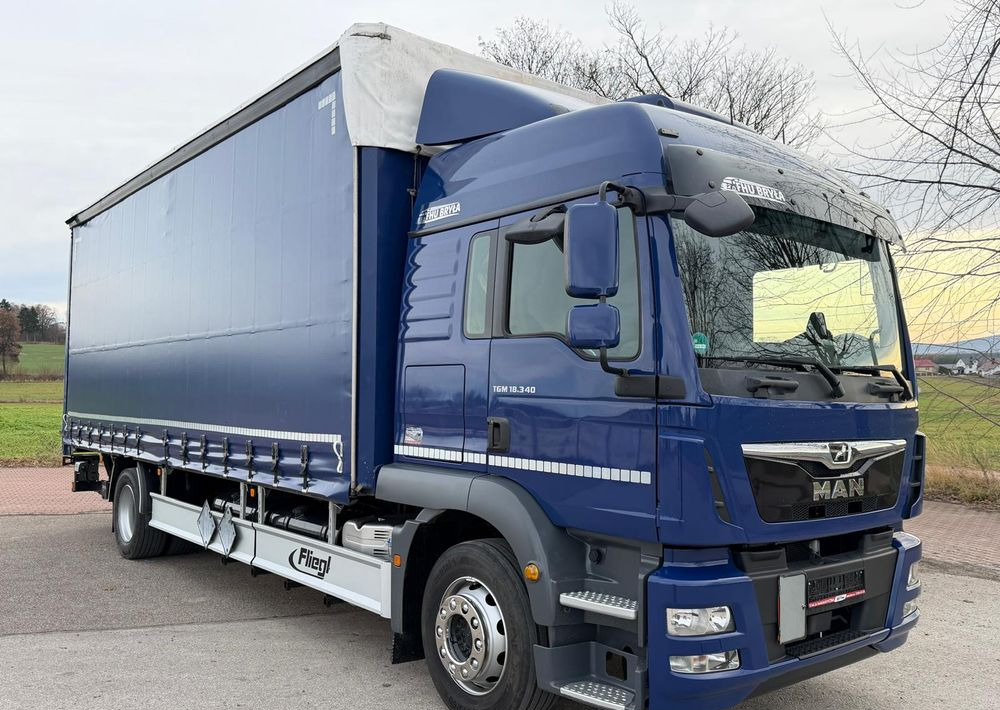 MAN TGM 18.340 / FIRANKA / LIFT / SPROWADZONY / KLIMA POSTOJOWA / 2017 / 9700 ŁADOWNOŚĆ / AUTOMAT / 18 PALET / E6 / WINDA / - Curtain side truck: picture 1 MAN TGM 18.340 / FIRANKA / LIFT / SPROWADZONY / KLIMA POSTOJOWA / 2017 / 9700 ŁADOWNOŚĆ / AUTOMAT / 18 PALET / E6 / WINDA / - Curtain side truck: picture 1