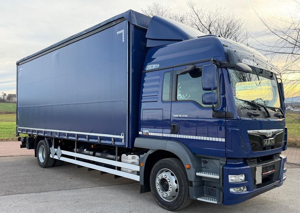 MAN TGM 18.340 / FIRANKA / SPROWADZONY / 9100 ŁADOWNOŚĆ / 18 PALET / E6 / WINDA / - Curtain side truck: picture 1 MAN TGM 18.340 / FIRANKA / SPROWADZONY / 9100 ŁADOWNOŚĆ / 18 PALET / E6 / WINDA / - Curtain side truck: picture 1