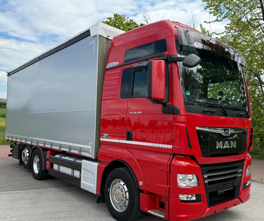 MAN TGX 26.500 / LIFT / 6X2 / KLIMA POSTOJOWA / 18PALET / E6 / FIRANKA / 18 TON ŁADOWNOŚĆ / WINDA / NISKI PRZEBIEG / JEDEN WŁAŚCICIEL / PODWIESZANA OŚ - Curtain side truck: picture 2 MAN TGX 26.500 / LIFT / 6X2 / KLIMA POSTOJOWA / 18PALET / E6 / FIRANKA / 18 TON ŁADOWNOŚĆ / WINDA / NISKI PRZEBIEG / JEDEN WŁAŚCICIEL / PODWIESZANA OŚ - Curtain side truck: picture 2