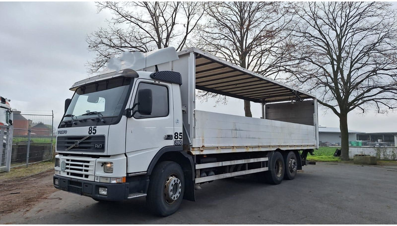 Volvo FM7 6x2 Koffer 3x vorhanden - Dropside/ Flatbed truck: picture 1 Volvo FM7 6x2 Koffer 3x vorhanden - Dropside/ Flatbed truck: picture 1
