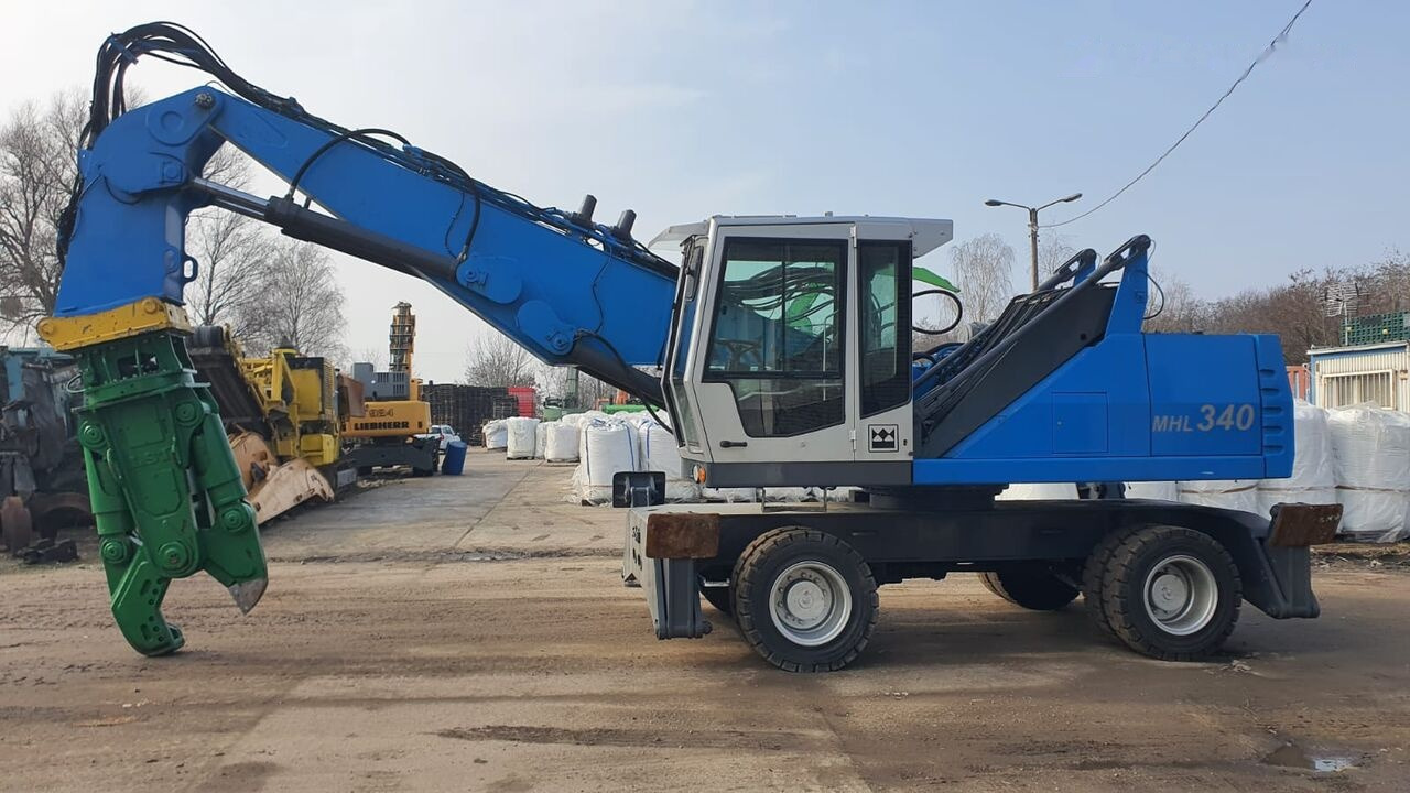 Fuchs MHL 340D FQC + LST 3to shear - Material handler: picture 1 Fuchs MHL 340D FQC + LST 3to shear - Material handler: picture 1