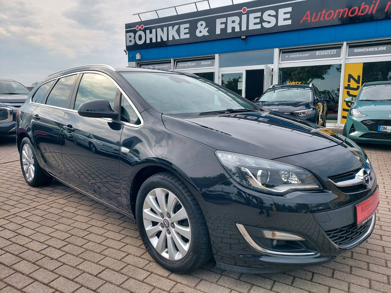 Opel Astra J Sports Tourer Exklusiv Navi Xenon AHK - Car: picture 1 Opel Astra J Sports Tourer Exklusiv Navi Xenon AHK - Car: picture 1
